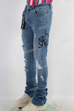Blue damaged skinny stack jeans