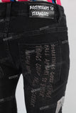 Black patchwork damaged skinny jeans