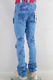 Blue damaged skinny stack jeans