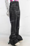 Double layered black waxed flared jeans