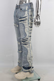 Blue damaged bell bottom jeans