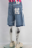 Blue patchwork boot cut shorts
