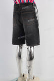 Black patchwork denim shorts