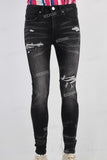 Black damaged skinny jeans