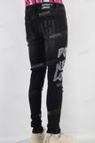 Black patchwork damaged skinny jeans