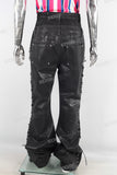 Double layered black waxed flared jeans