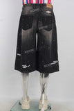 Acid washed damaged rhinestone patchwork shorts