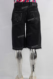 Black damaged patchwork laser shorts