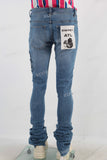 Blue damaged skinny stack jeans