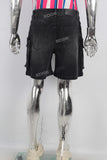 Black patchwork cargo laser shorts