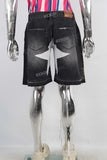 Black embroidered damaged shorts