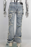 Blue damaged bell bottom jeans