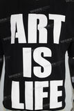 Black screen print boot cut t shirt