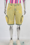 Yellow embroidered boot cut shorts