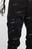 Black paint splatters patchwork jeans