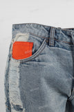 Blue damaged flare jeans