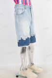 Acid washed patchwork boot cut shorts