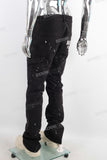 Black paint splatters patchwork jeans