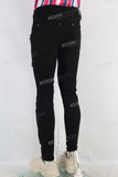 Black skinny damaged denim jeans