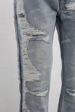 Blue damaged flare jeans