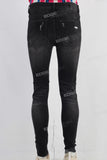 Black damaged skinny jeans