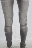 Black acid washed damaged skinny jeans