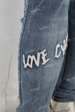 Damaged embroidered patchwork skinny jeans