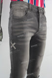 Black acid washed damaged skinny jeans