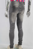 Black acid washed damaged skinny jeans