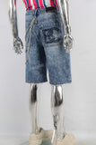 Blue patchwork damaged boot cut shorts