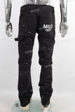 Black paint splatters patchwork jeans