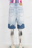 Acid washed patchwork boot cut shorts