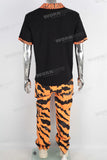 Black embroidered t shirt and tiger pattern pants