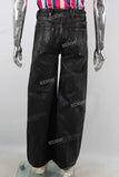 Black wax baggy boot cut jeans