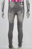 Black acid washed damaged skinny jeans