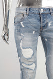 Blue damaged skinny jeans