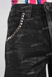 Black waxed patchwork shorts