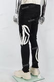 Men's Black Ripped Jeans with White Leather Patch