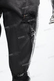 Black waxed and rhinestoned ripped Skinny Jeans