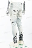 Light blue distressed rewashed tattered embroidered Skinny Jeans