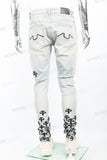 Light blue distressed rewashed tattered embroidered Skinny Jeans