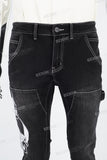 Black embroidered patchwork flared overalls