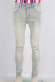Acid washed damaged skinny jeans