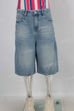 Blue acid washed damaged shorts