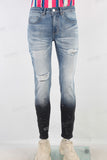 Blue damaged paint splatters skinny jeans