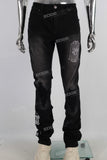 Black damaged embroidered zip up stack jeans