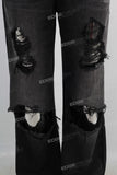 Black wide leg damaged boot cut jeans