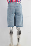 Blue embroidered boot cut shorts