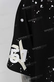 Black digital print paint splatters t shirt
