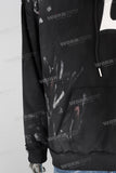 Acid washed embroidered paint splatters hoodie